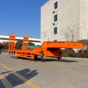 25 100 Ton Low Flatbed Semi Trailer Hydraulic Lowboy Semi Truck Trailer Low Bed Trailer With Dolly