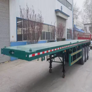 3/4 Axles FlatBed Transport Trailer with Reinforced Steel Frame for Heavy Equipment and Cargo Long-Distance Logistics Solutions