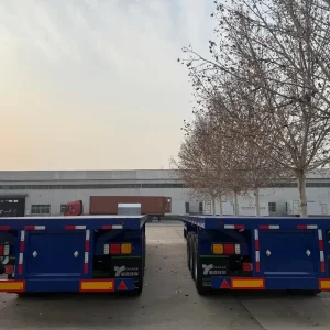 Customized 3 4 Axles 20 40 45ft Steel Container Semi Trailer Truck Trailer Designed For America Flatbed Trailer for Sale