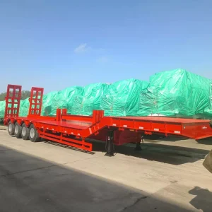 Durable and Lightweight Steel Low Flatbed Semi Trailer with 100,000 kg Load Capacity for Heavy Machinery Transportation