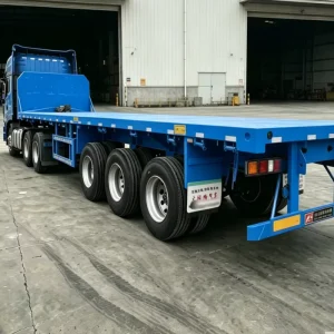 Factory direct Sale of Low priced Flatbed Trailers 2 axle RHINOSTRONG 40T Leaf Spring Container Transport Vehicle