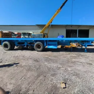 Forty Ft Flatbed Semi Trailer Three Axle Container Transport Trailer Heavy Load Platform Truck Trailer