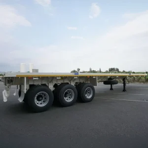 Heavy Duty 3 Axle Flatbed Semi Trailer 40-60Ton Anti-slip Deck for Steel Cargo and Construction Machinery Haulage