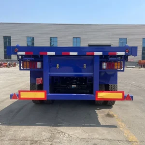 Heavy Duty 3 Axle Flatbed Semi Trailer 40-60Ton Anti-slip Deck for Steel Cargo and Construction Machinery Haulage