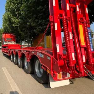 Heavy Duty Flatbed Cargo Semi Trailer Hydraulic Ramp Durable Q460 Steel Platform 80/100 Tons Payload for Logistics Construction