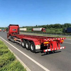 Tri Axle 80Ton Steel Container Chassis Semi Trailer Heavy Duty Skeleton Frame for ISO Container Hauling